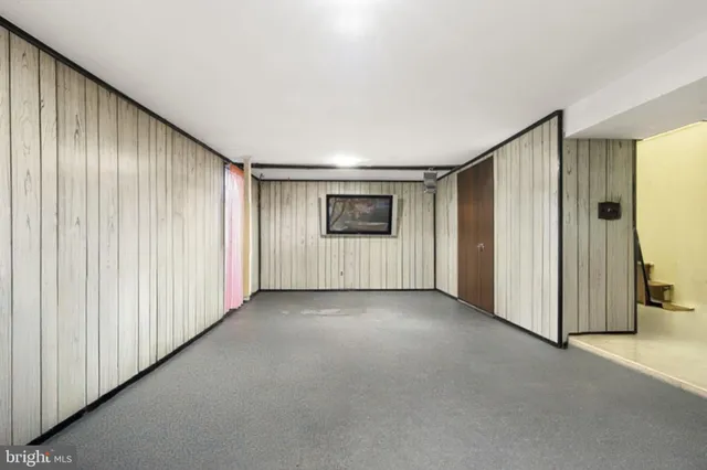 an empty room with a door