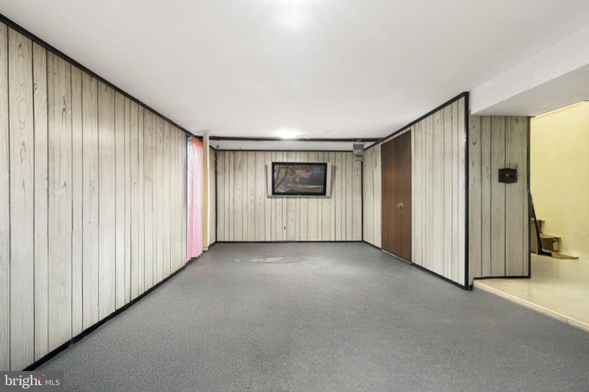 52 Carol Lane Malvern, PA 19355 - Photo 7 of 14 an empty room with a door