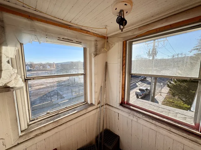 a view of a living room and window