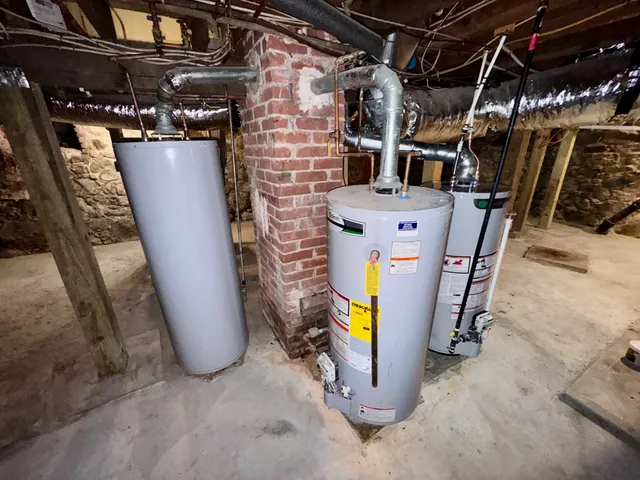 a view of a storage room with water heater and racks