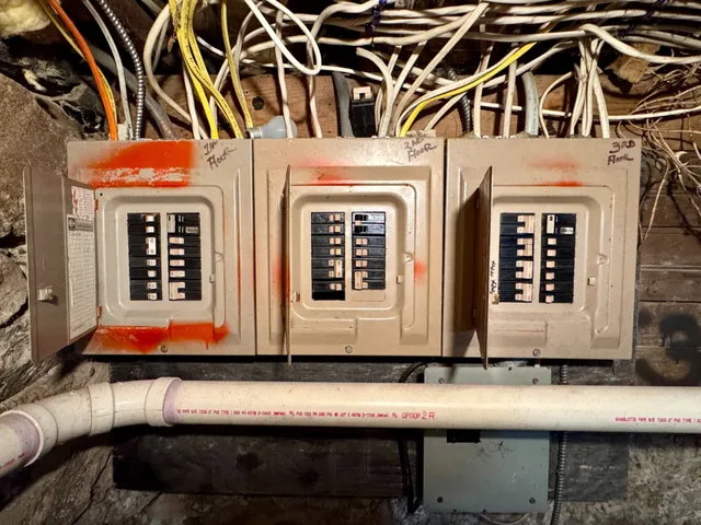 a view of a building with car parked