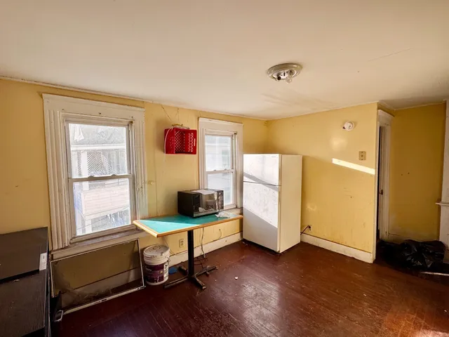 a room with furniture and a window