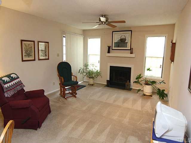 3702 Chimney Ridge Place, Unit 104 Durham, NC 27713 - Photo 11 of 12 This floor plan has a living room that is much more spacious than some of the other designs within the community! Notice the woodburning fireplace!