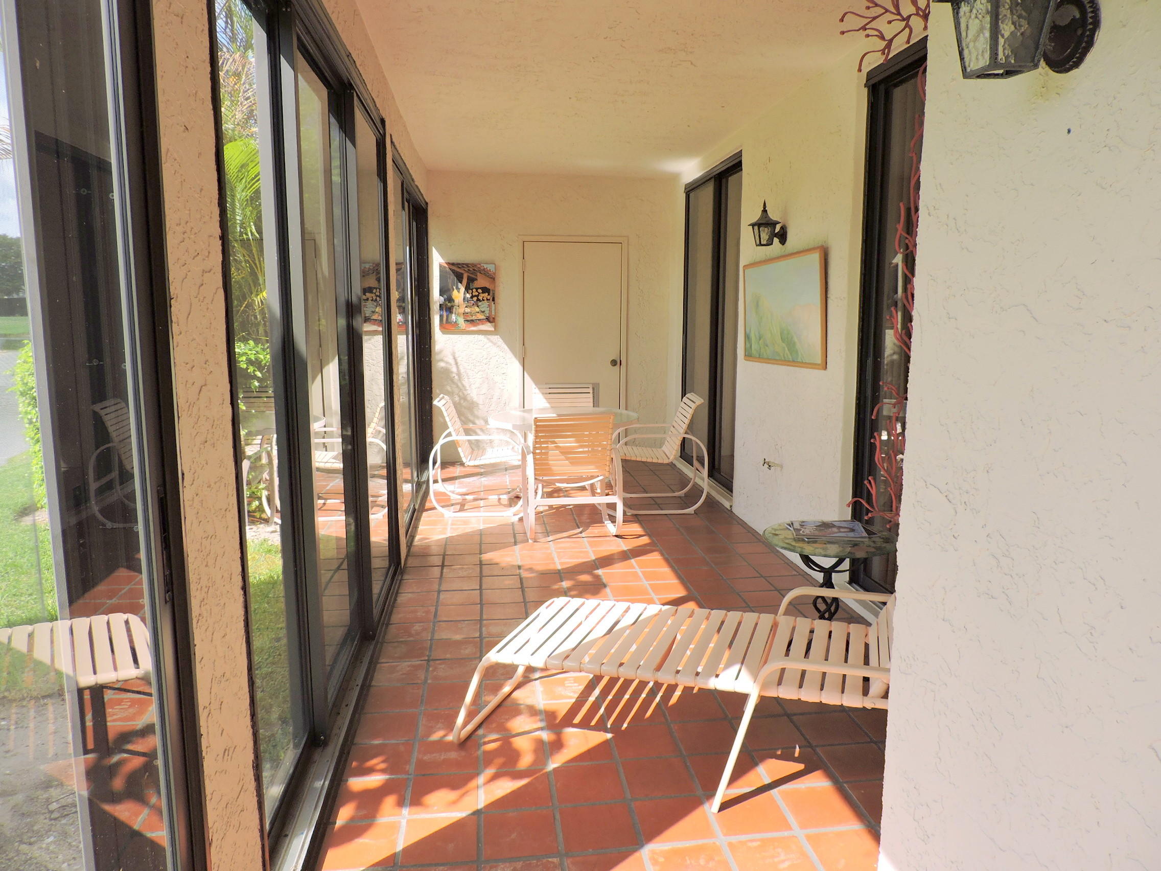 7720 La Mirada Drive Boca Raton, FL 33433 - Photo 24 of 27 33 foot glassed terrace