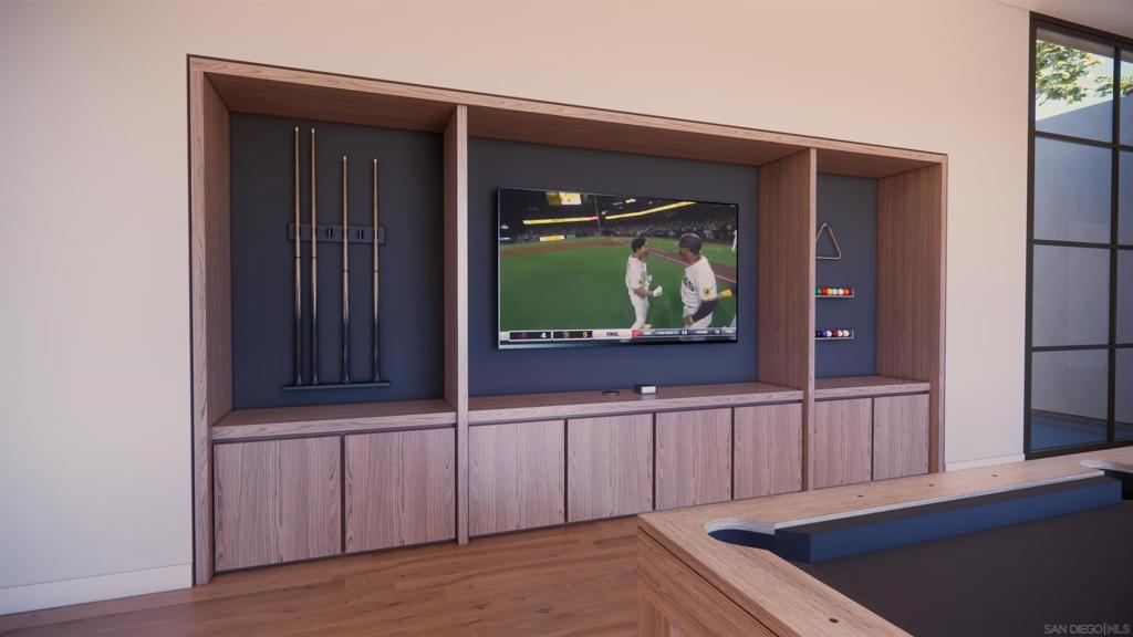 16256 Via Del Alba Rancho Santa Fe, CA 92067 - Photo 13 of 42 a living room with wooden floor and flat screen tv