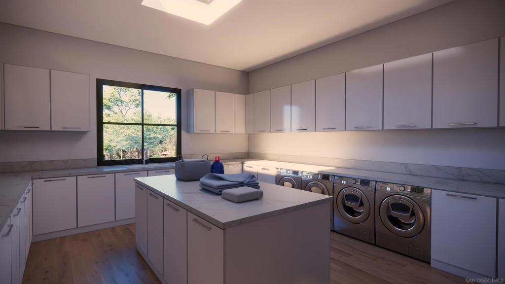 16256 Via Del Alba Rancho Santa Fe, CA 92067 - Photo 37 of 42 a kitchen with a sink cabinets and window