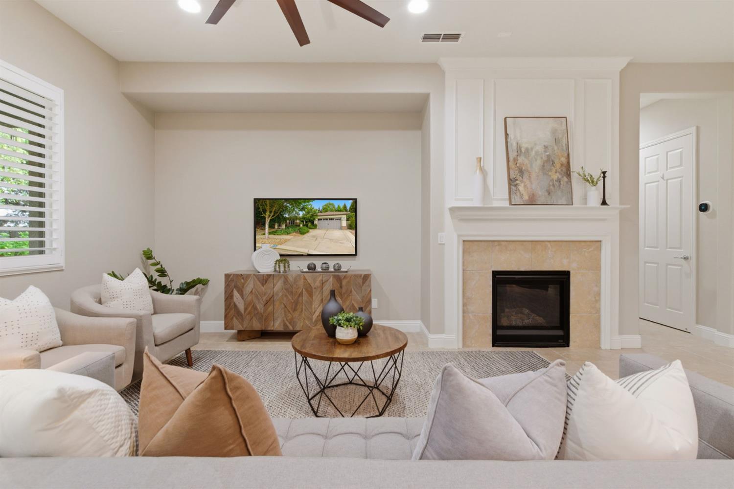 2499 Appleleaf Lane Manteca, CA 95336 - Photo 18 of 55 a living room with furniture and a fireplace