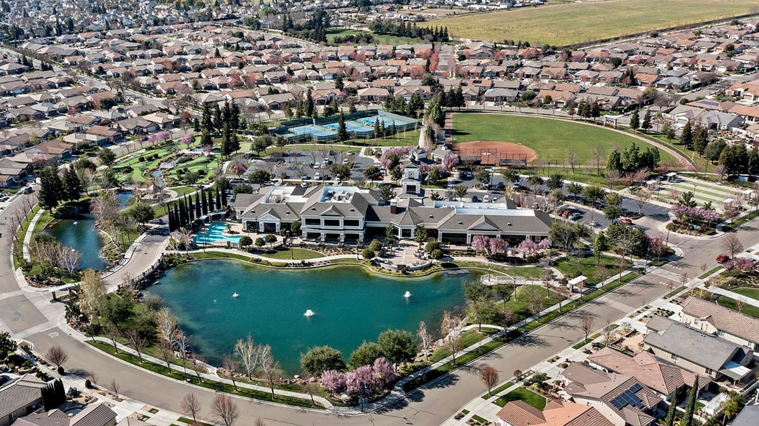 2499 Appleleaf Lane Manteca, CA 95336 - Photo 50 of 55 an aerial view of a residential houses with outdoor space and swimming pool