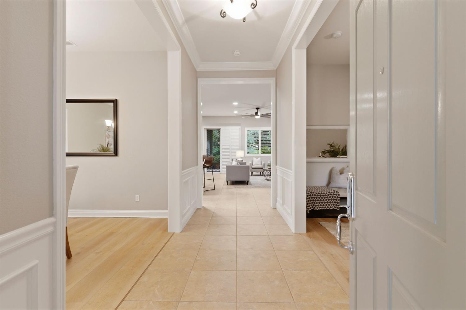 2499 Appleleaf Lane Manteca, CA 95336 - Photo 9 of 55 a view of a hallway with a livingroom and a dinning area a bathroom