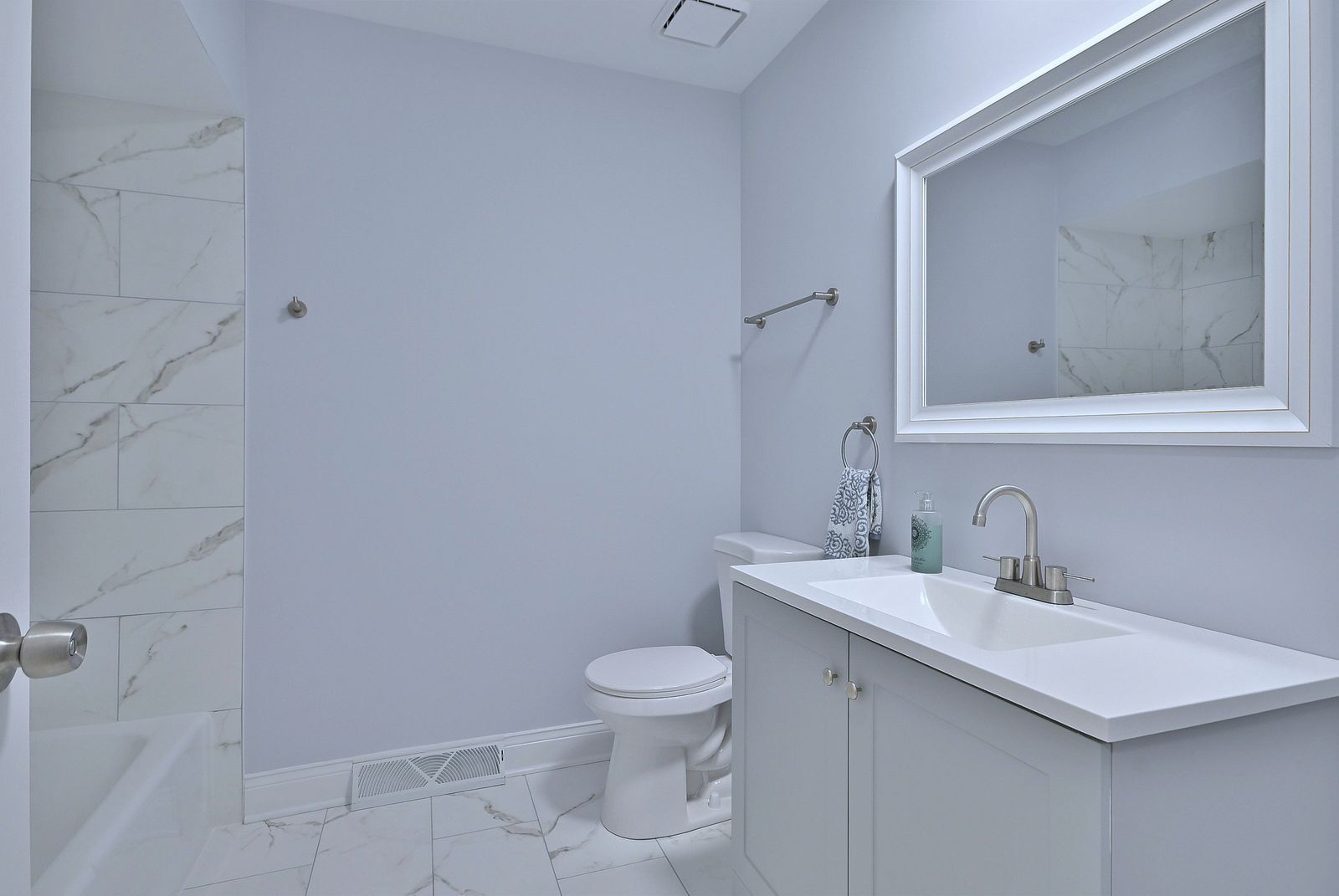 15262 74th Avenue, Unit 36 Orland Park, IL 60462 - Photo 15 of 25 a bathroom with a sink toilet and mirror