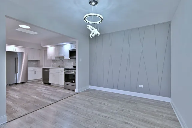 a view of a kitchen with a sink cabinets and window