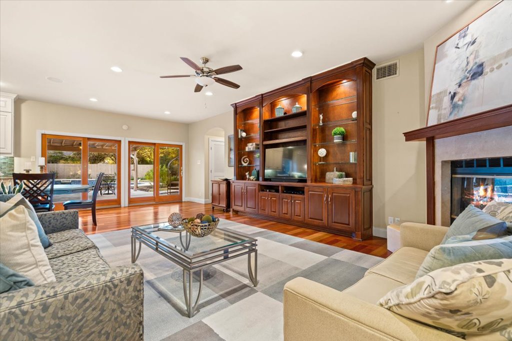 3803 Frodo Cove Austin, TX 78739 - Photo 18 of 40 a living room with furniture and a flat screen tv
