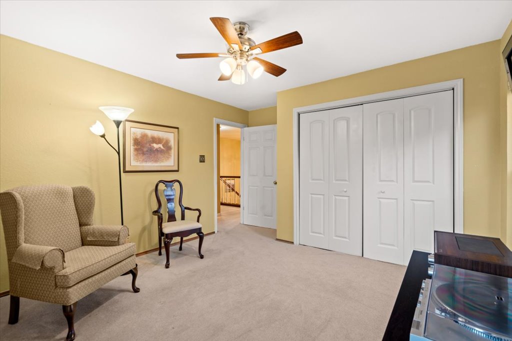 3803 Frodo Cove Austin, TX 78739 - Photo 30 of 40 a living room with furniture and ceiling fan