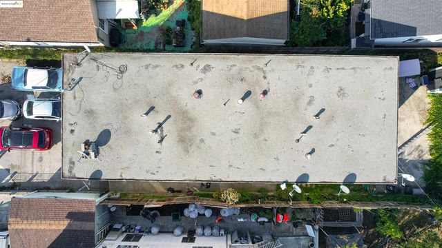 an aerial view of a house with outdoor space