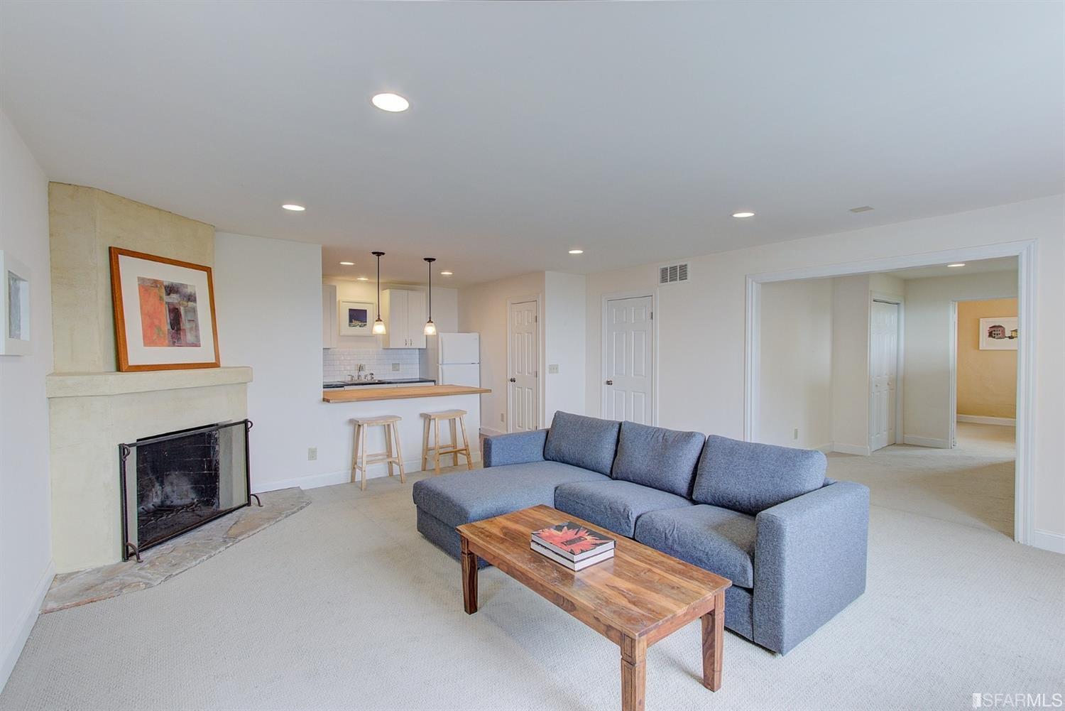 520 Cragmont Avenue Berkeley, CA 94708 - Photo 35 of 48 Au Pair Unit living room with wood burning fireplace.