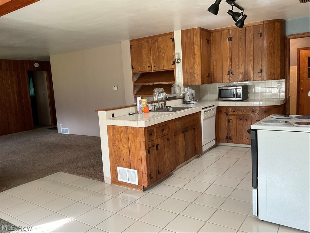 3295 McCartney Road Campbell, OH 44405 - Photo 13 of 25 Custom made wormy walnut cabinets