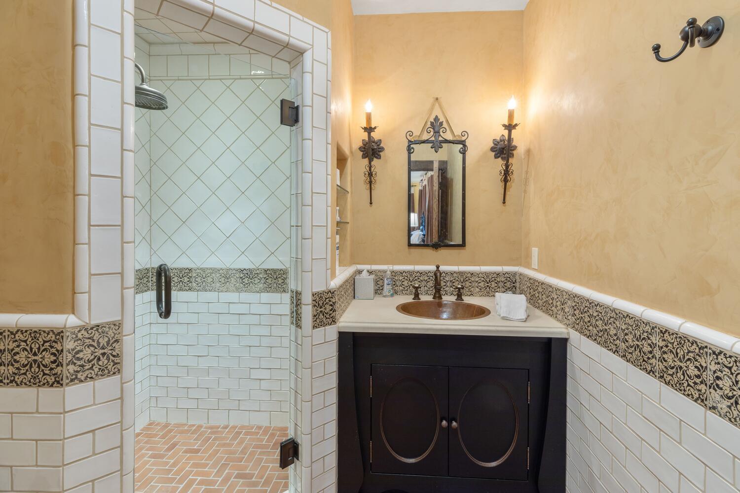 274 Benchmark Drive Mountain Village, CO 81435 - Photo 52 of 58 a bathroom with a sink and a mirror