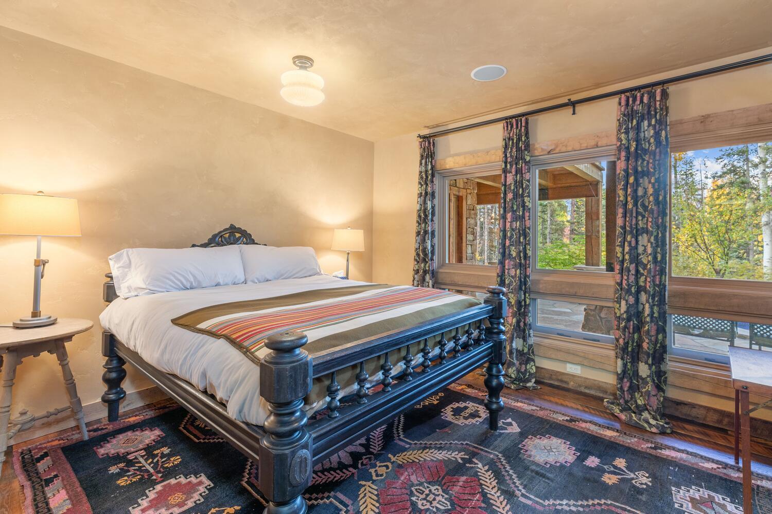 274 Benchmark Drive Mountain Village, CO 81435 - Photo 54 of 58 a bedroom with a bed table and a balcony