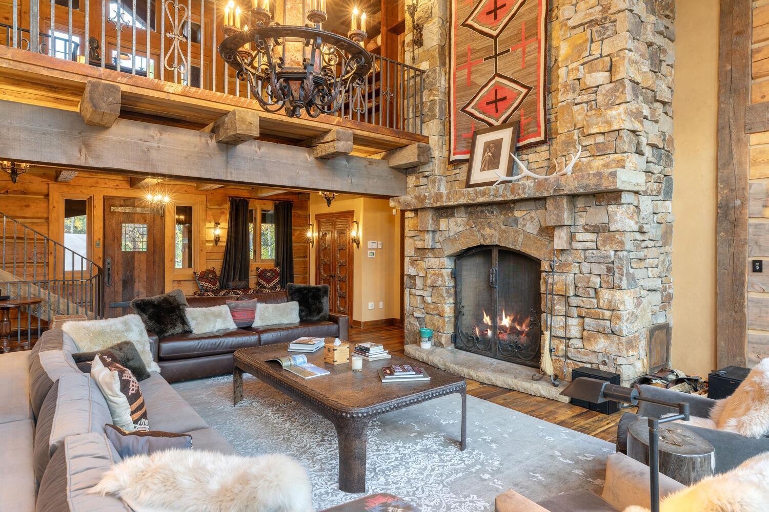 274 Benchmark Drive Mountain Village, CO 81435 - Photo 9 of 58 a living room with furniture a fireplace and window