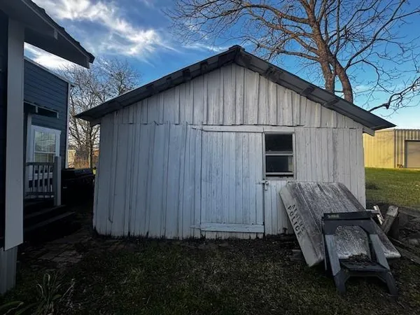 an aerial view of a houses with outdoor space