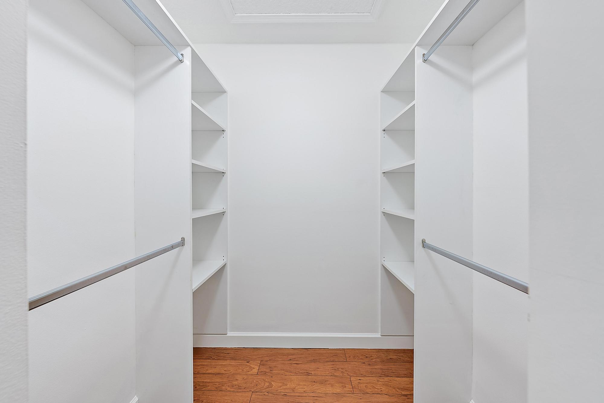 12 Bentwood Road Palm Beach Gardens, FL 33418 - Photo 15 of 40 a view of staircase with white walls and door