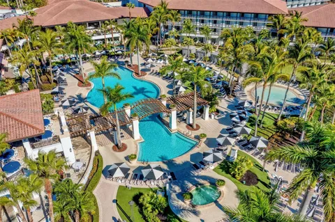an aerial view of a house yard and street view