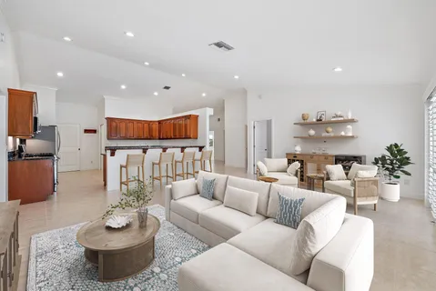 a living room with furniture and a table