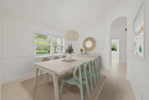 a view of a dining room and chairs