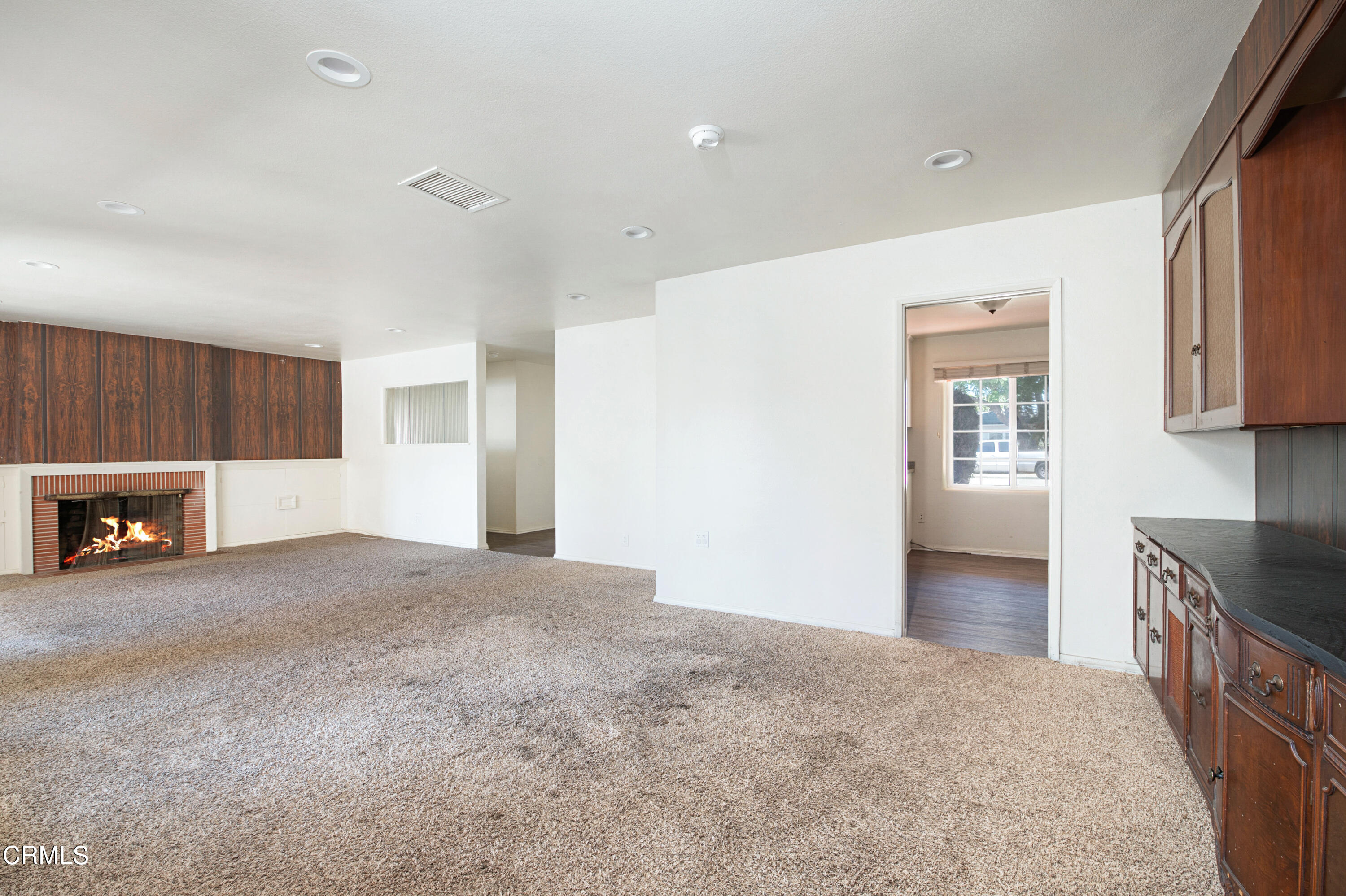 458 West Roderick Avenue Oxnard, CA 93030 - Photo 8 of 18 a view of a kitchen with a sink a refrigerator and window