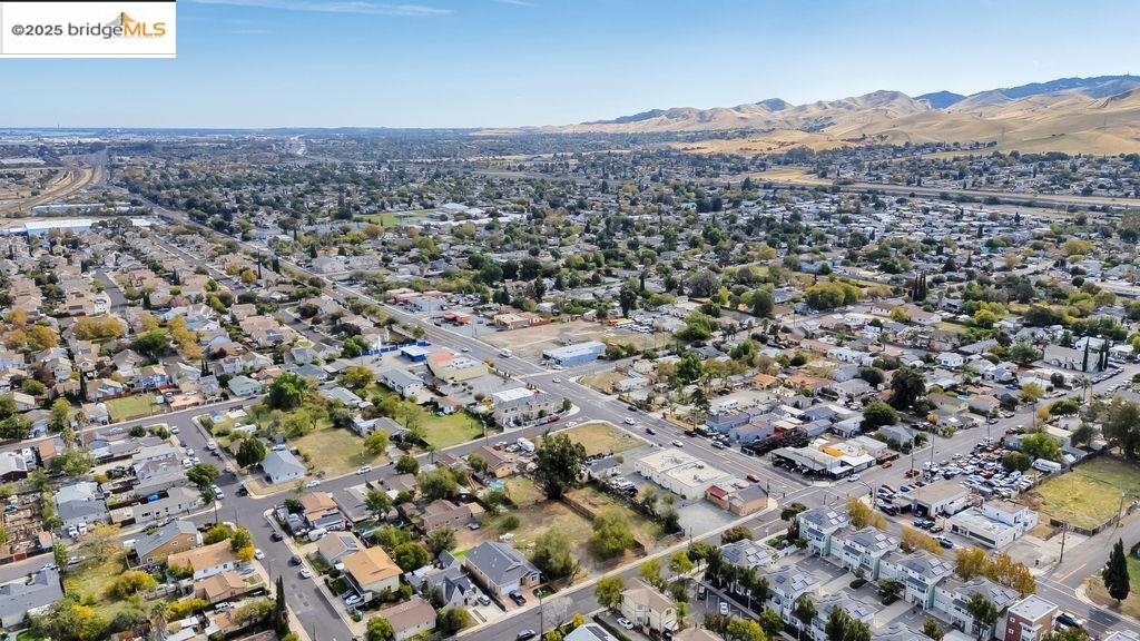 64 South Bella Monte Avenue Bay Point, CA 94565 - Photo 27 of 38 an aerial view of a residential houses and city view