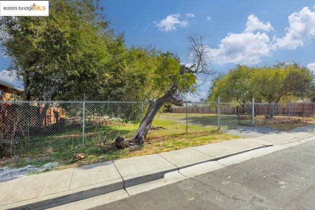a view of a yard with an outdoor space
