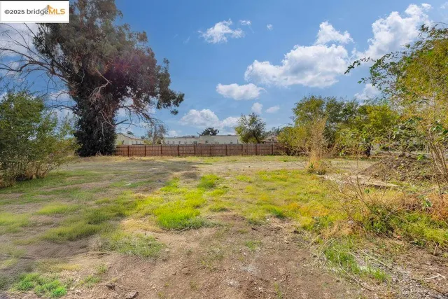 a view of a golf course with a yard