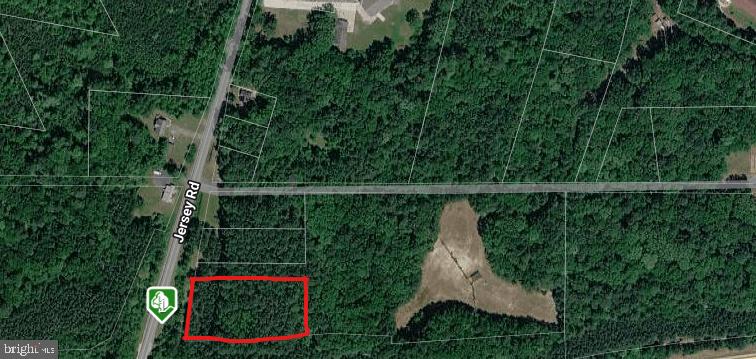 a sign that is on the wall in front of a building