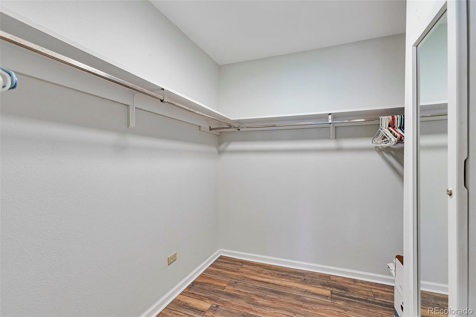 650 South Clinton Street, Unit 3A Denver, CO 80247 - Photo 12 of 25 a view of a room with racks on the wall