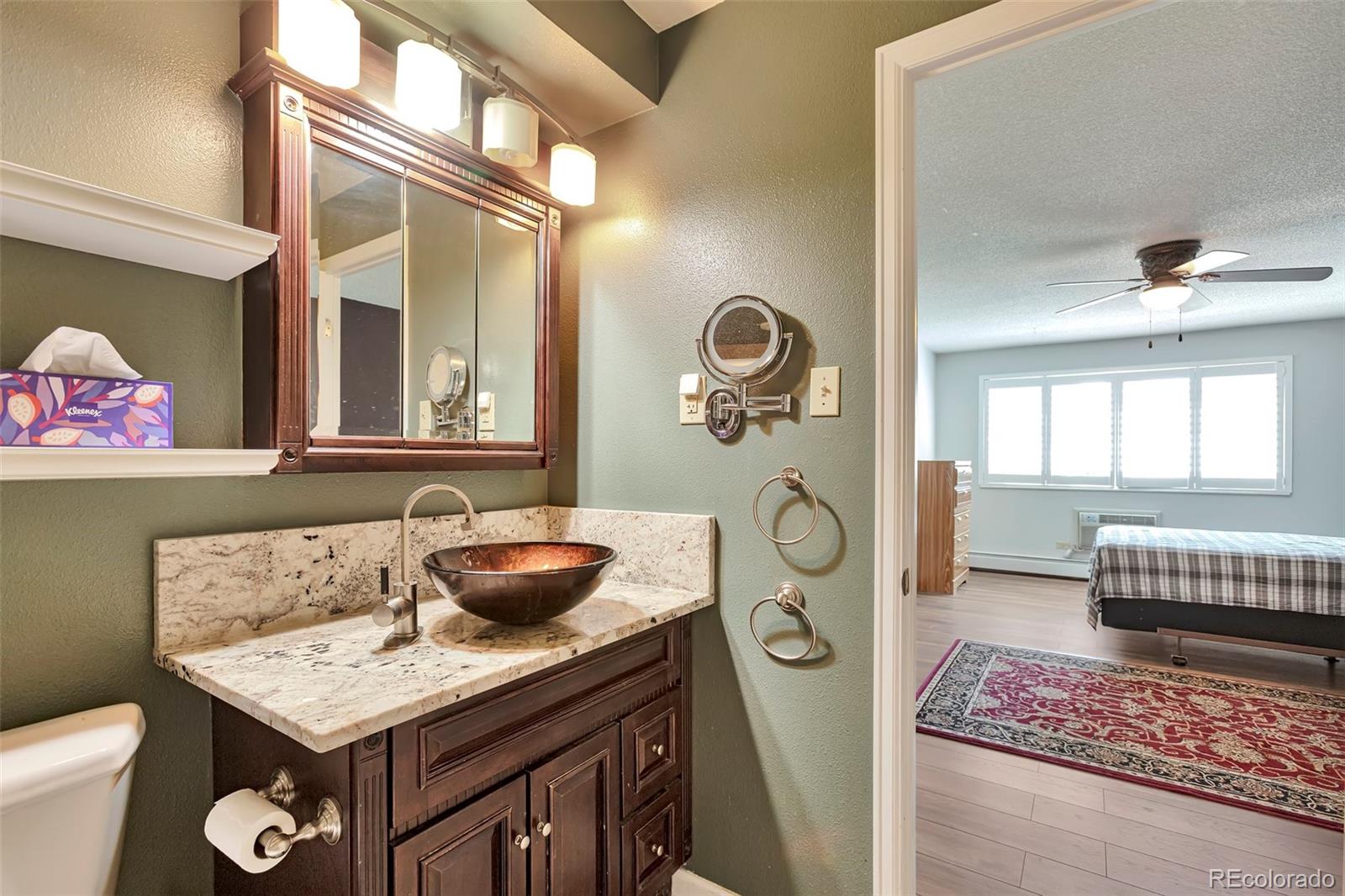650 South Clinton Street, Unit 3A Denver, CO 80247 - Photo 15 of 25 a living room with furniture and a window