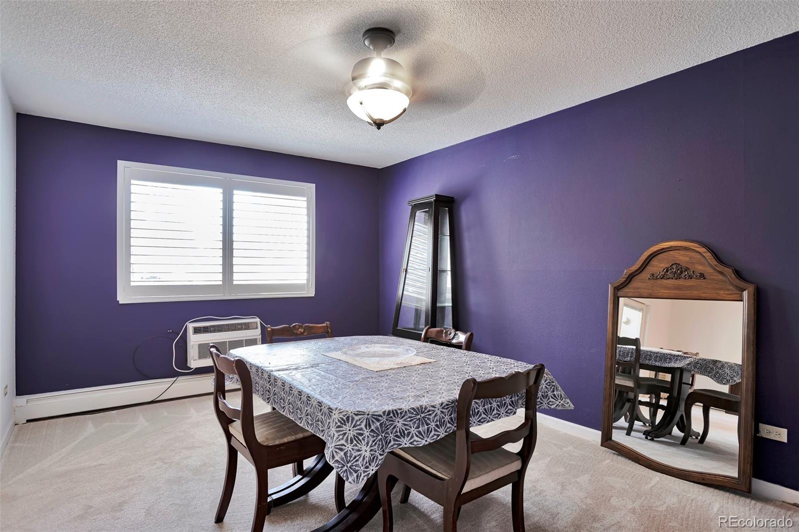 650 South Clinton Street, Unit 3A Denver, CO 80247 - Photo 19 of 25 a dining room with furniture and window