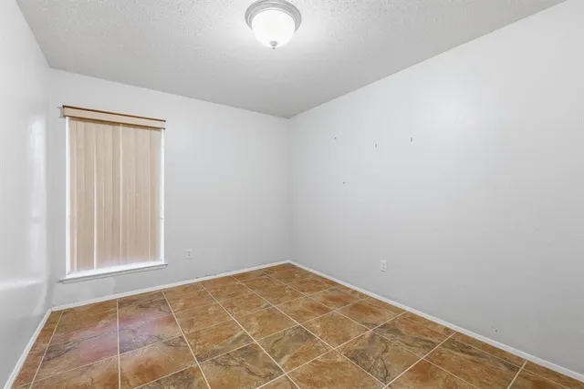 an empty room with a workbench