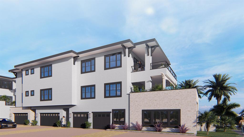 a front view of residential houses with yard