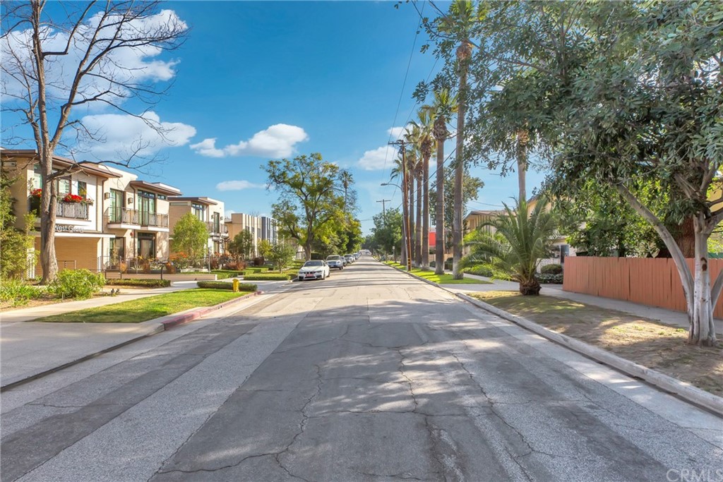 125 Hurlbut Street, Unit 101 Pasadena, CA 91105 - Photo 34 of 53 a view of a house with a yard and pathway