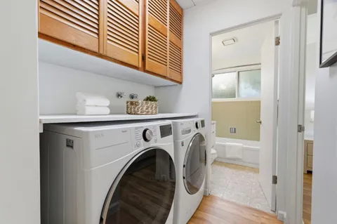 a utility room with dryer and washer