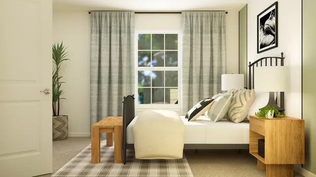 a bedroom with a bed and a large window