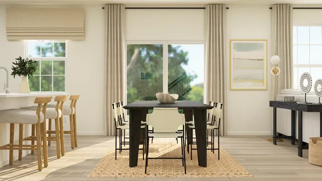 a dining room with furniture and window