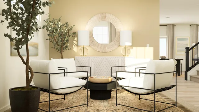 a view of a dining room with furniture and a potted plant