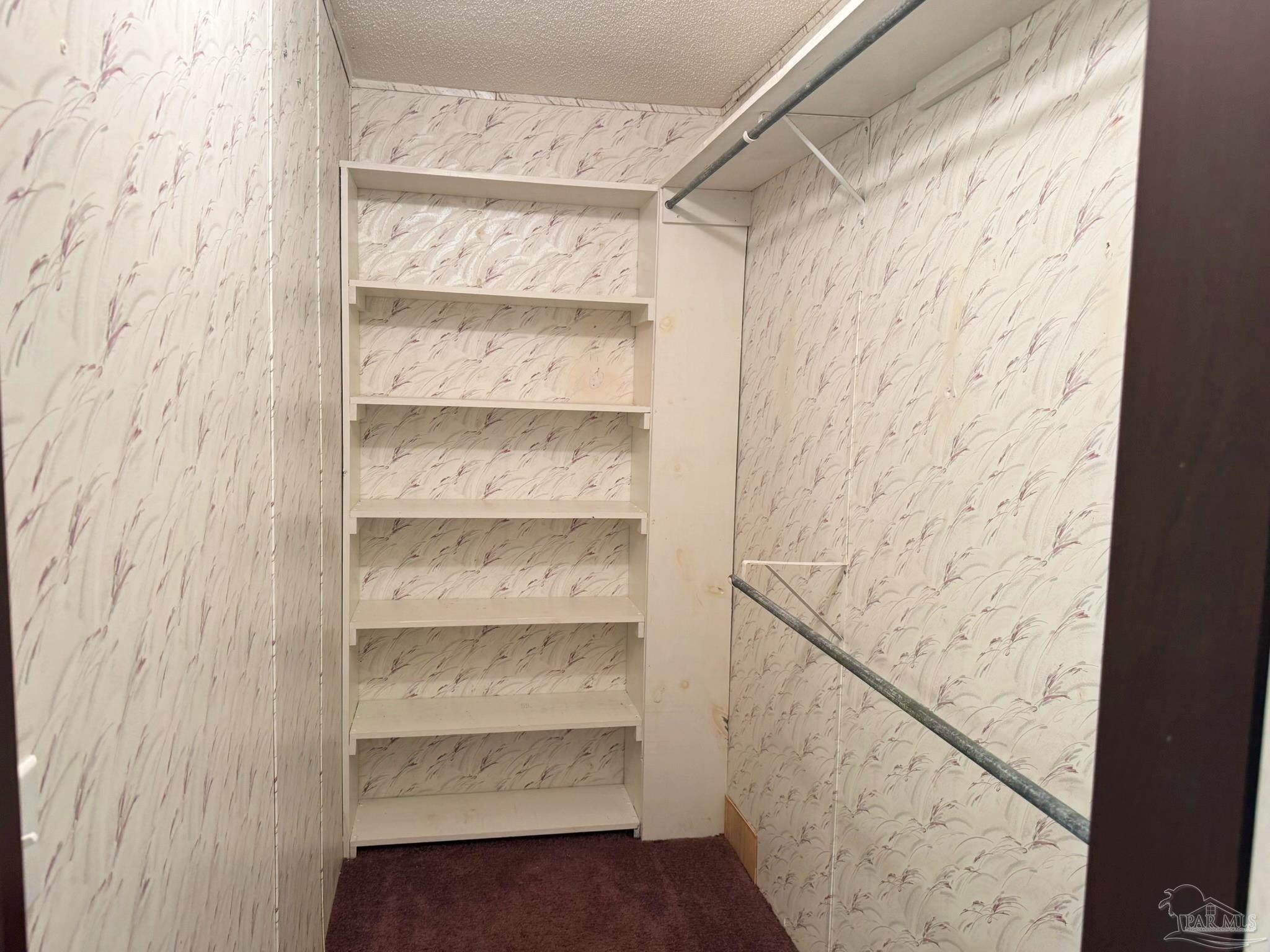 818 Twin Bridges Road Flomaton, AL 36441 - Photo 11 of 33 a view of a small room with shelf