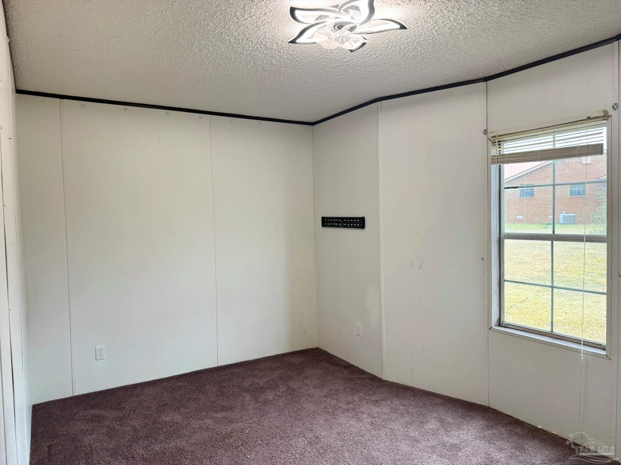 818 Twin Bridges Road Flomaton, AL 36441 - Photo 17 of 33 an empty room with a window