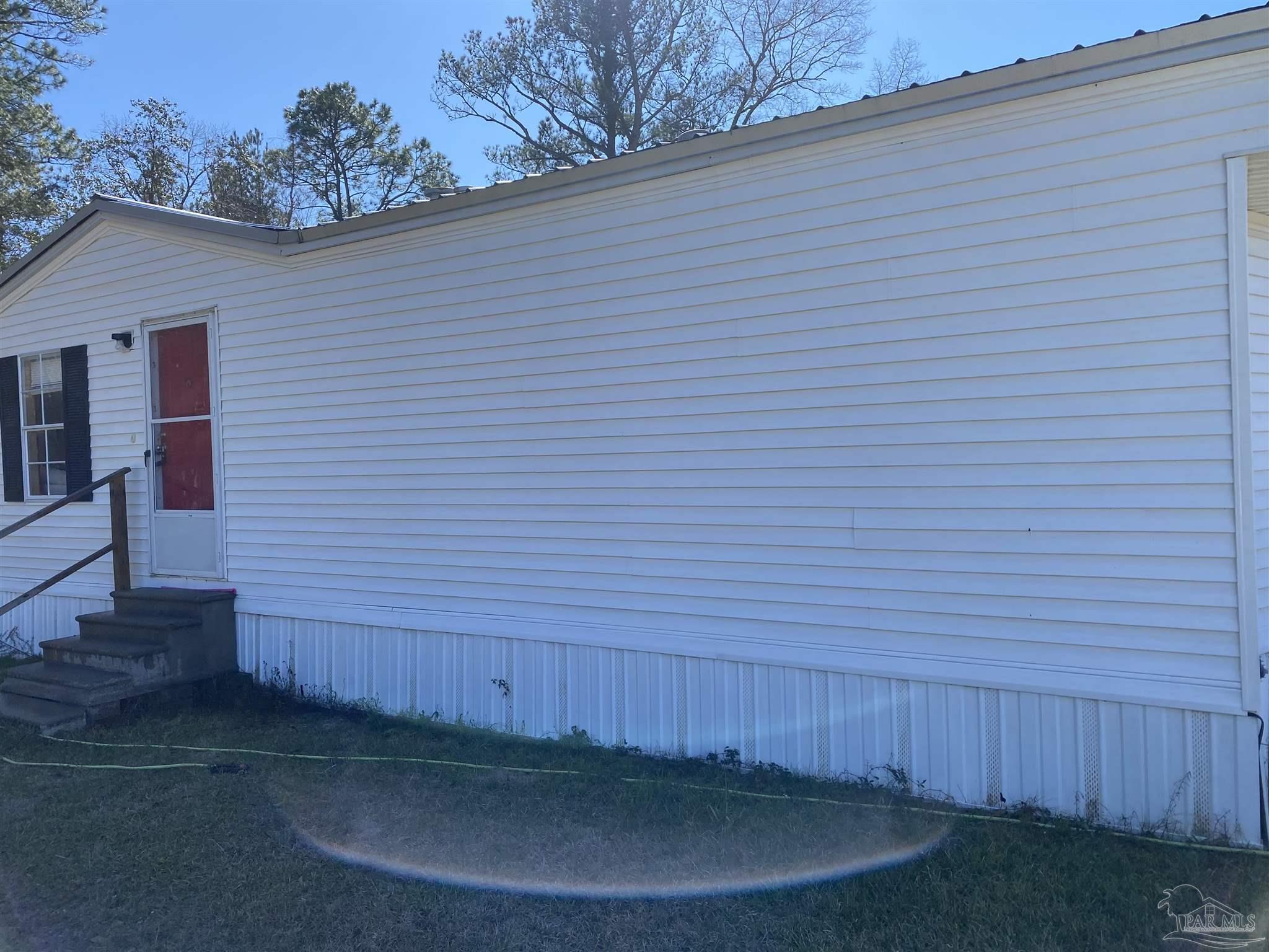 818 Twin Bridges Road Flomaton, AL 36441 - Photo 22 of 33 a view of a backyard