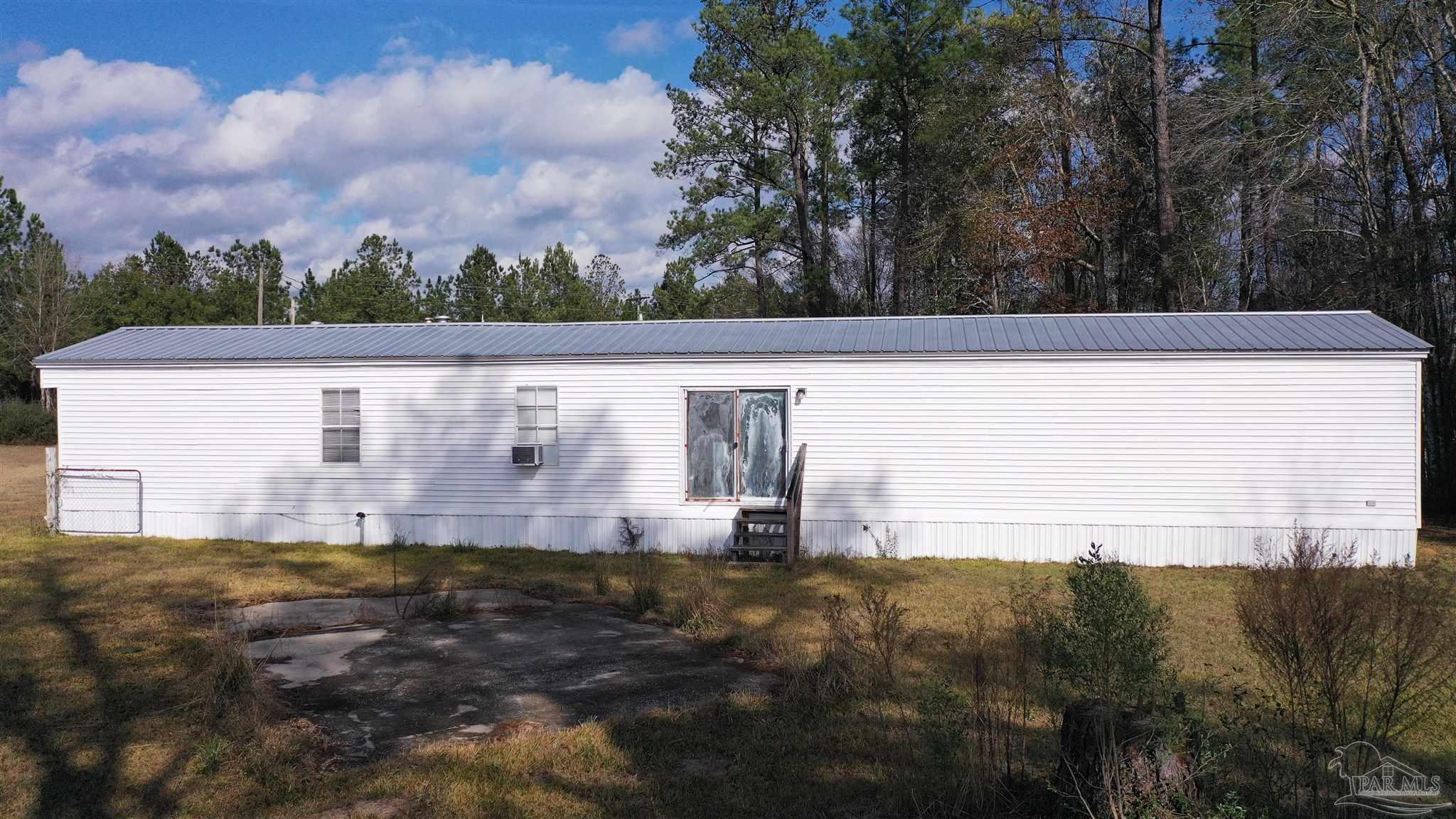 818 Twin Bridges Road Flomaton, AL 36441 - Photo 24 of 33 a view of a back yard