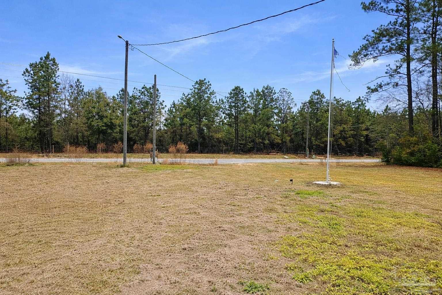 818 Twin Bridges Road Flomaton, AL 36441 - Photo 27 of 33 a view of a tennis court
