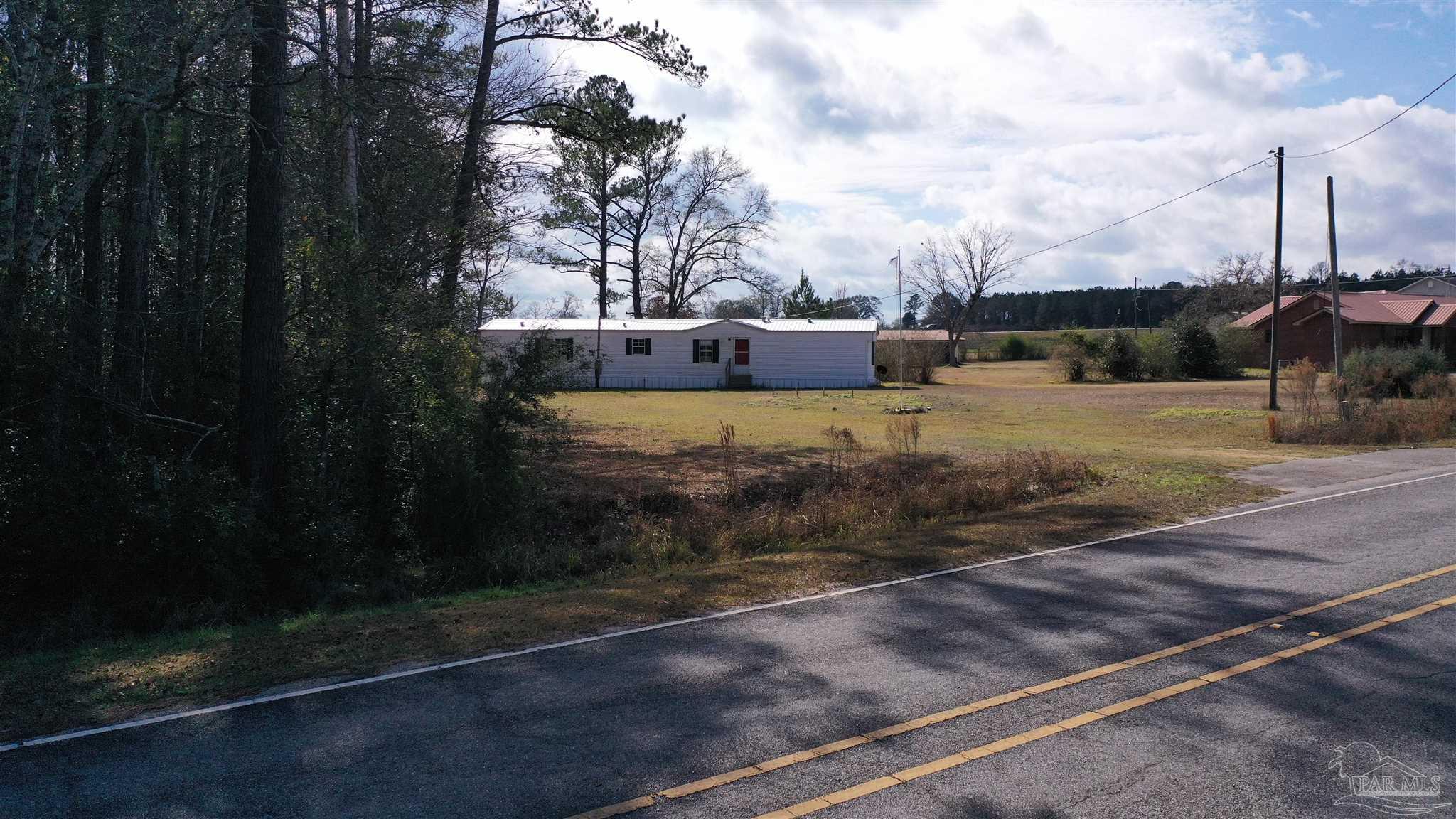 818 Twin Bridges Road Flomaton, AL 36441 - Photo 4 of 33 a view of a backyard