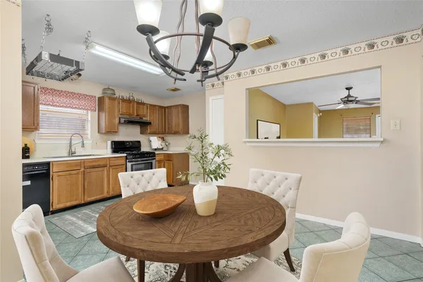 a view of a dining room with furniture